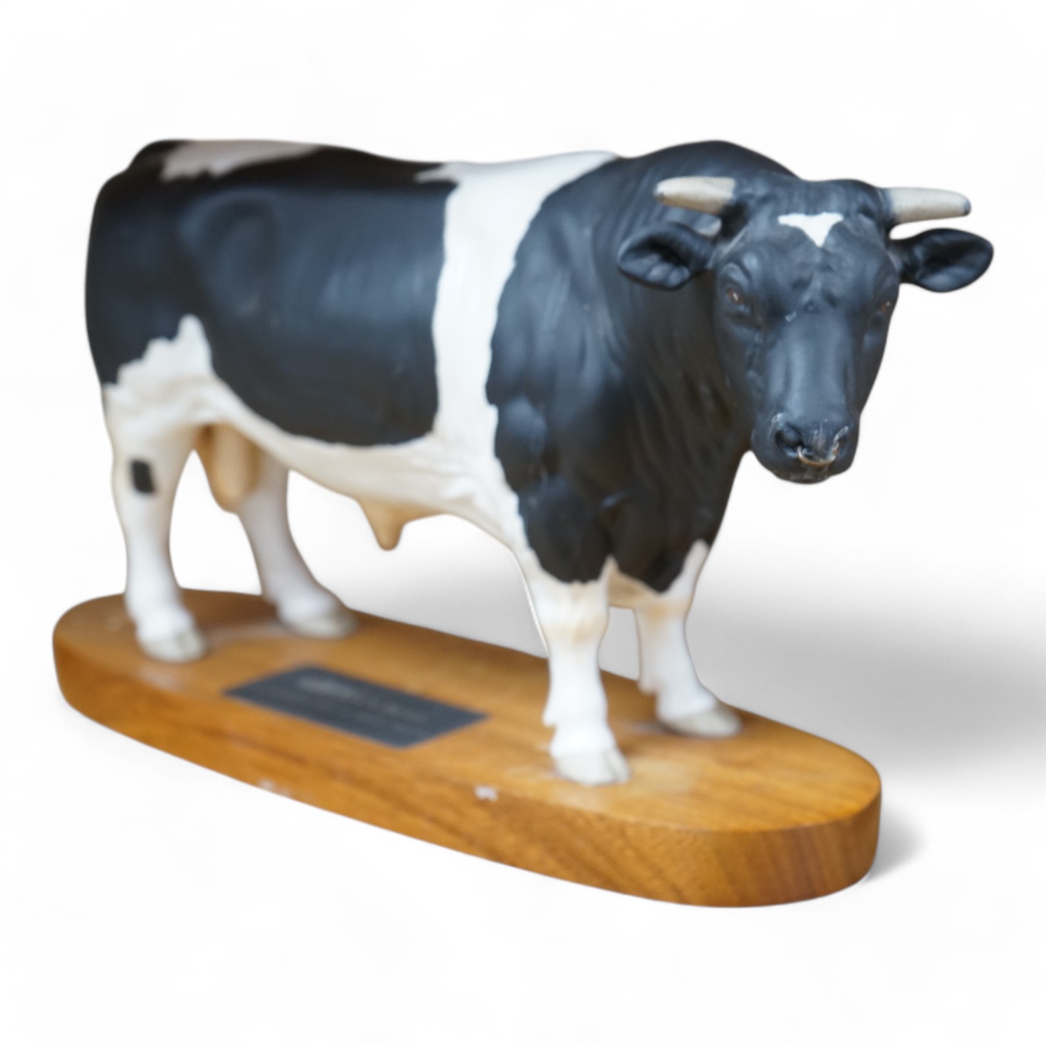 A Beswick ‘Fresian bull’, 29cm wide. Conditon - good